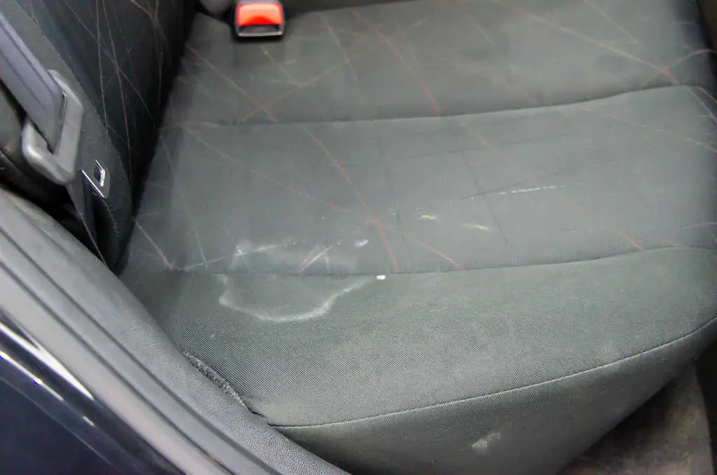 Sunscreen stains on car seat