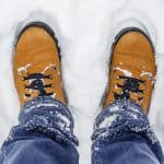 leather boots on snow